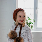 Terracotta Hand-knitted double pompon hat - orkids boutique